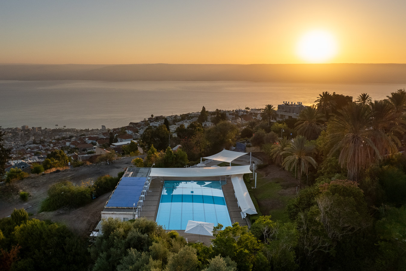 Hotel pool at sunset